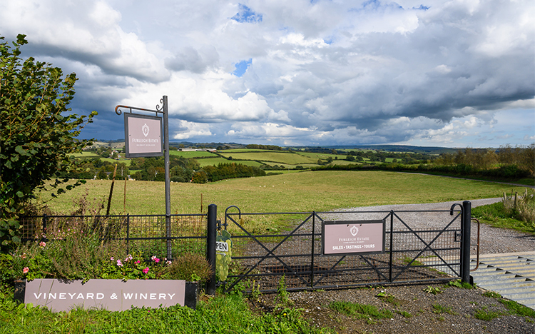 Furleigh Estate road side signage and gate, view from the road.